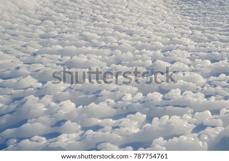 texture of ice on blue background