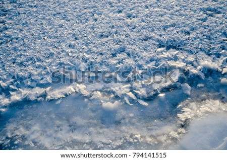 texture of ice on blue background