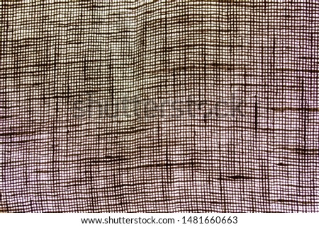 Texture of an indonesian bali fabric blanket made of linen cotton
