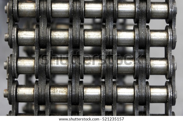 Texture of\
industrial roller chains as\
background