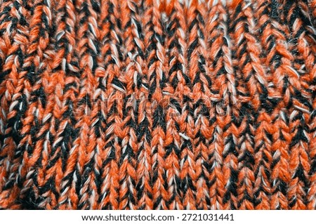 Texture of the interweaving colored wool threads in a sock. Background