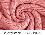 Texture of knitted woolen pink cloth. Winter sweater background