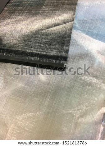 Texture of the Laminate Composite Fabric (cuben fiber) DCF