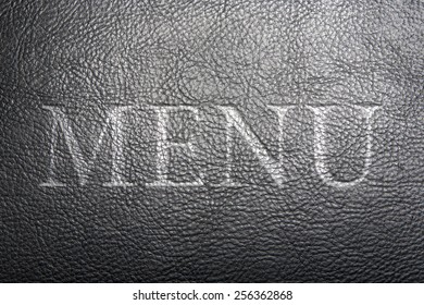 Texture Of The Leather Black With Embossed Letters: Menu