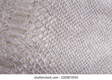 The texture of the leather product. Decorative abstract background.