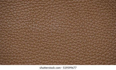 The texture of leather. Upholstery leather for upholstery, car interiors. color coconut