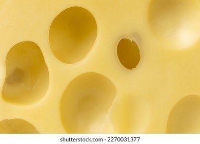 Texture of maasdam cheese with holes close-up - Powered by Shutterstock