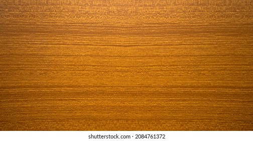 The texture of mahogany in the style of the 70s. Material for the manufacture of wooden countertops and furniture. The background for the text is made of wood. - Shutterstock ID 2084761372