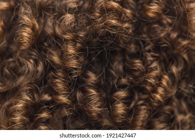 texture of male curly hair close up. perm for men. stylish hairdo.