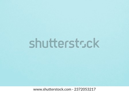 Texture material background taken from light blue colored construction paper