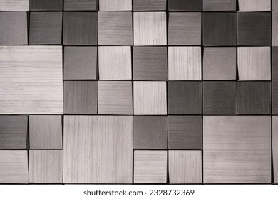 texture metal squares of different sizes and shades of steel color