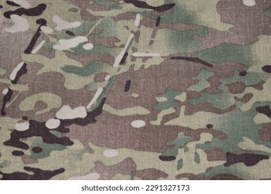 Texture of multicam fabric  Used for making bags and clothes.