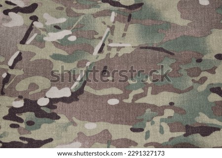 Texture of multicam fabric  Used for making bags and clothes.