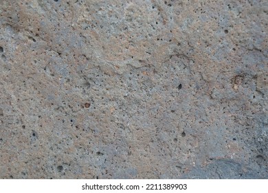 Texture Of Natural Basalt Extrusive Igneous Rock Background.