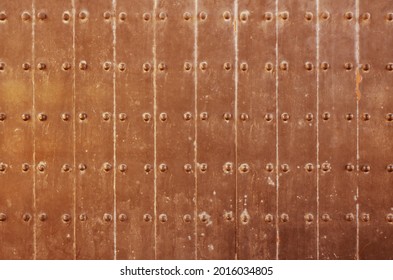 Texture Of Old Copper Plate Door. Old Castle Gate Background