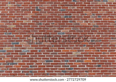 Texture of an old red brick wall in Nord-Pas-de-Calais, France