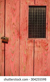 texture of old red door with window