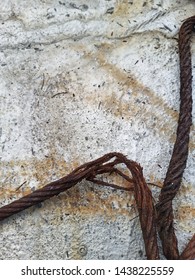 Texture Of Old , Rusty , And Broken Steel Wire Cable On Concrete Floor -image