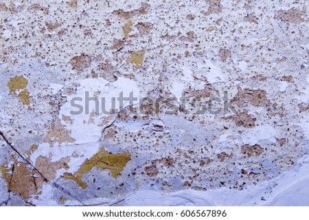 Texture of an old scratched shabby wall.
