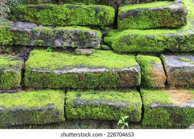 Texture Of Old Stone Covered By Moss