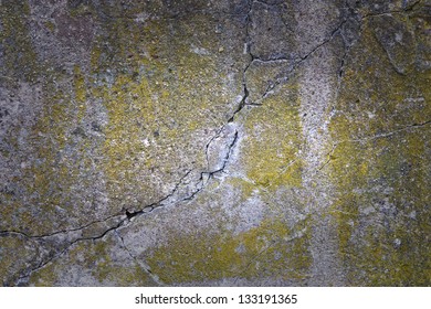 Texture Of The Old Stone Wall Covered With Moss