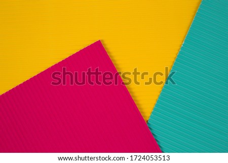 Texture of parallel lines, different colors, with space for text, flat lay. 