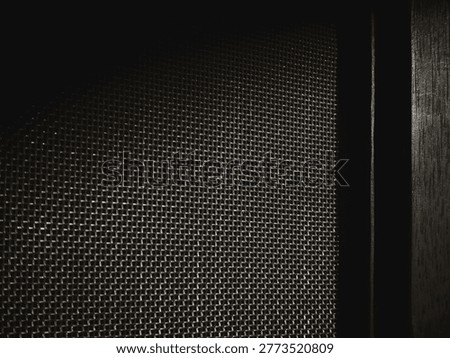 Texture and pattern of a door screen mesh. Concept of home window insect protection, mosquito net background.