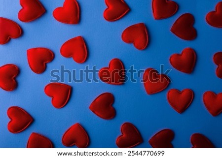 texture pattern of red hearts on blue cyan background Valentines day card concept. Heart for Valentines Day Background.