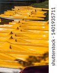 texture pattern of yellow kayaks by the lake