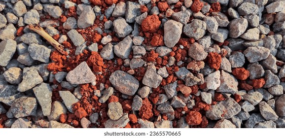 the texture of pile stone, roughnes of stone, abstract background of pattern stone with red ground, Red lava rock gravel, Gravel for background,
Coarse gravel texture  - Shutterstock ID 2365570665