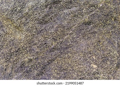 Texture Of Porous Stone With Yellow Inclusions