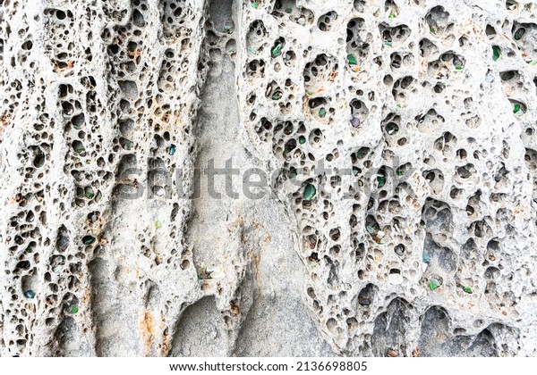 texture of porous stones
on the beach, nature, natural phenomena, brown gray stones. High
quality photo