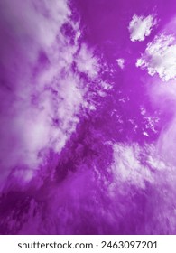 Texture of purple sky with clouds background