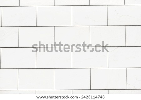 Texture of rectangular white tiles.