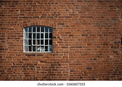 Texture of red brick wall .