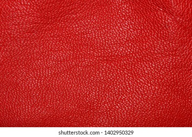 Texture of red leather rumpled