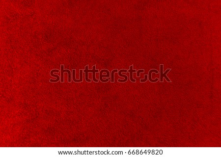 The texture of the red velvet. The background of red cloth. Background of red velvet
