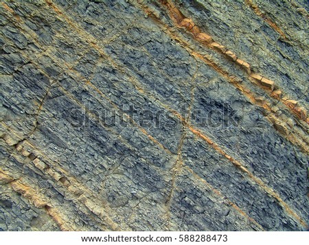 The texture of the rock. The texture of the stone. Background.