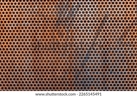 Texture of rusted metal mesh wall. 