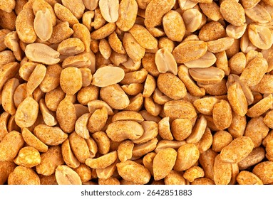 Texture of salted and roasted peanut as background, top view. Chili spicy peanuts.