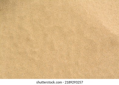 Texture of sandy beach as background, top view - Shutterstock ID 2189293257