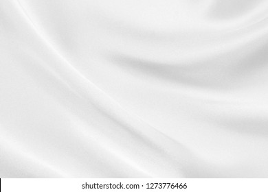 The texture of the satin fabric of white color for the background - Shutterstock ID 1273776466