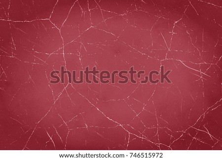 Texture of scrapes, red background of school board