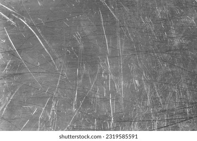 Texture of scratched metallic surface as background, closeup