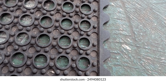 The texture and shape of a patterned rubber mat