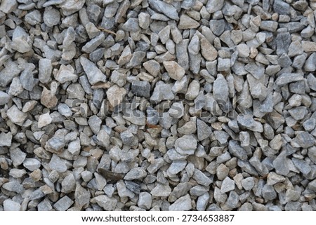 Texture of Small Angular Granite Stones for Landscaping and Path Construction