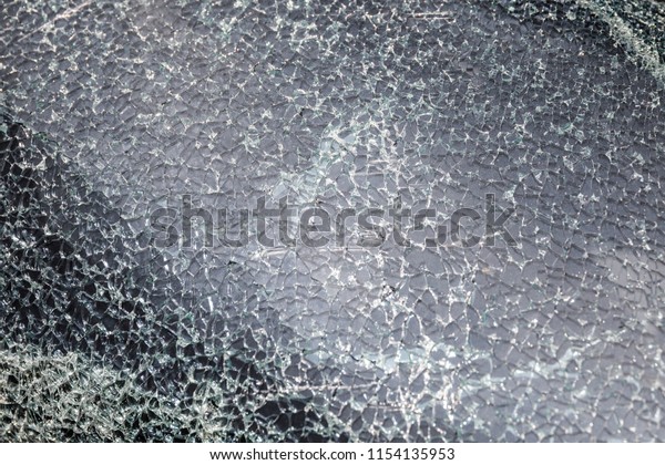 Texture of the smashed\
car window glass