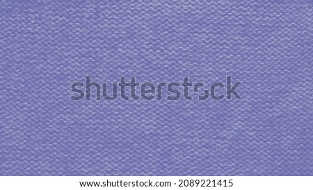 Texture of smooth knitted sweater with pattern. Handmade knitting wool or cotton fabric texture. Background of knitting patterns front and back stitch. Color Of The Year 2022 - Very Peri.