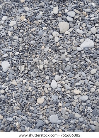 Texture of stone and pebbles on the  beach
