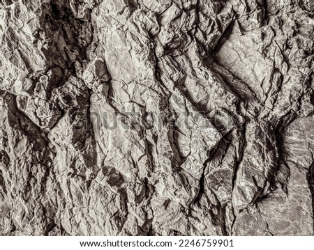 Texture of stone, rock. Wallpaper, postcard, grunge background, desaturated colors, natural materials, nature background. 
